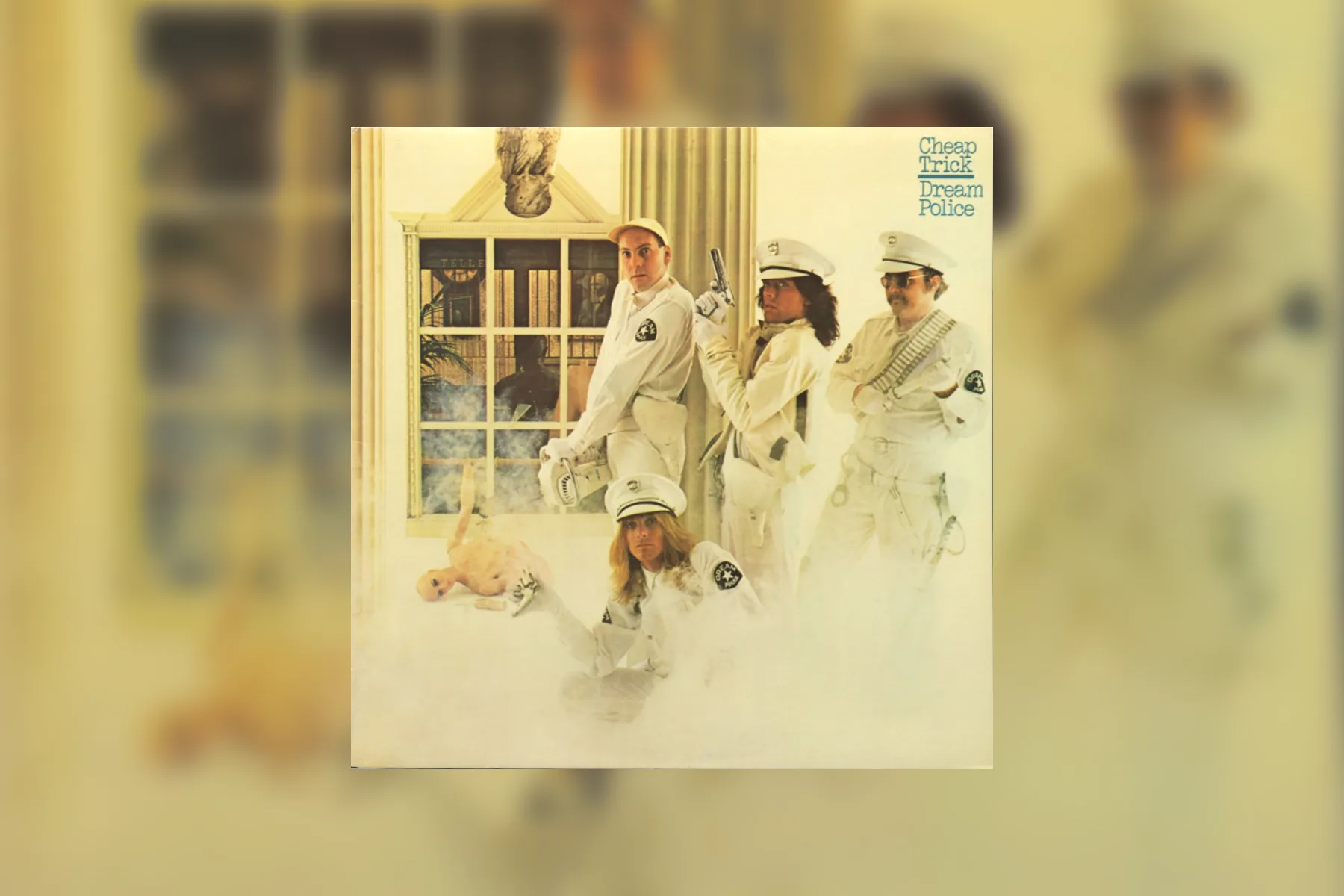 The 1979 Epic album cover for Cheap Trick's Dream Police showing the band dressed as police officers in a surreal white room