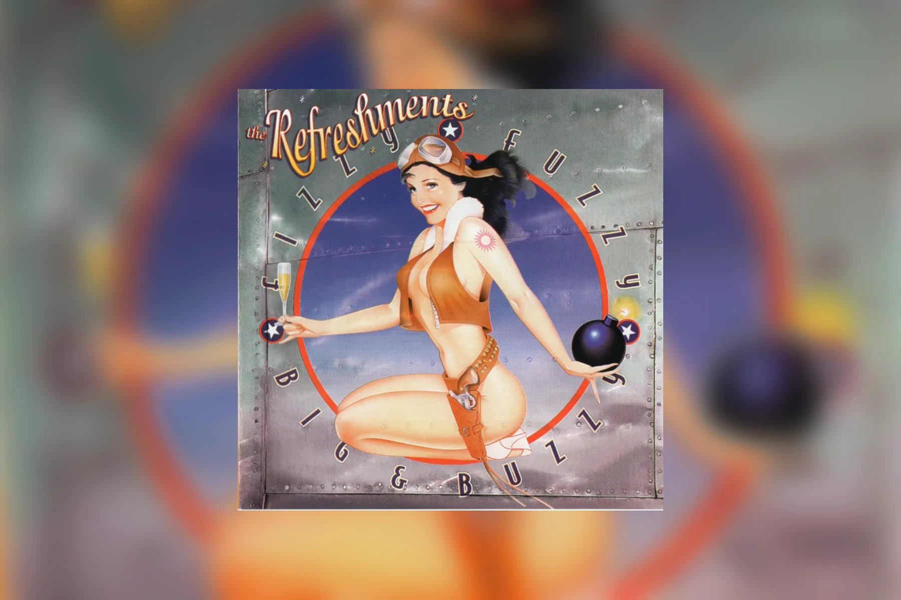 The Discogs album cover for The Refreshments' Fizzy Fuzzy Big & Buzzy showing a painted pin-up pilot holding a drink and a bomb