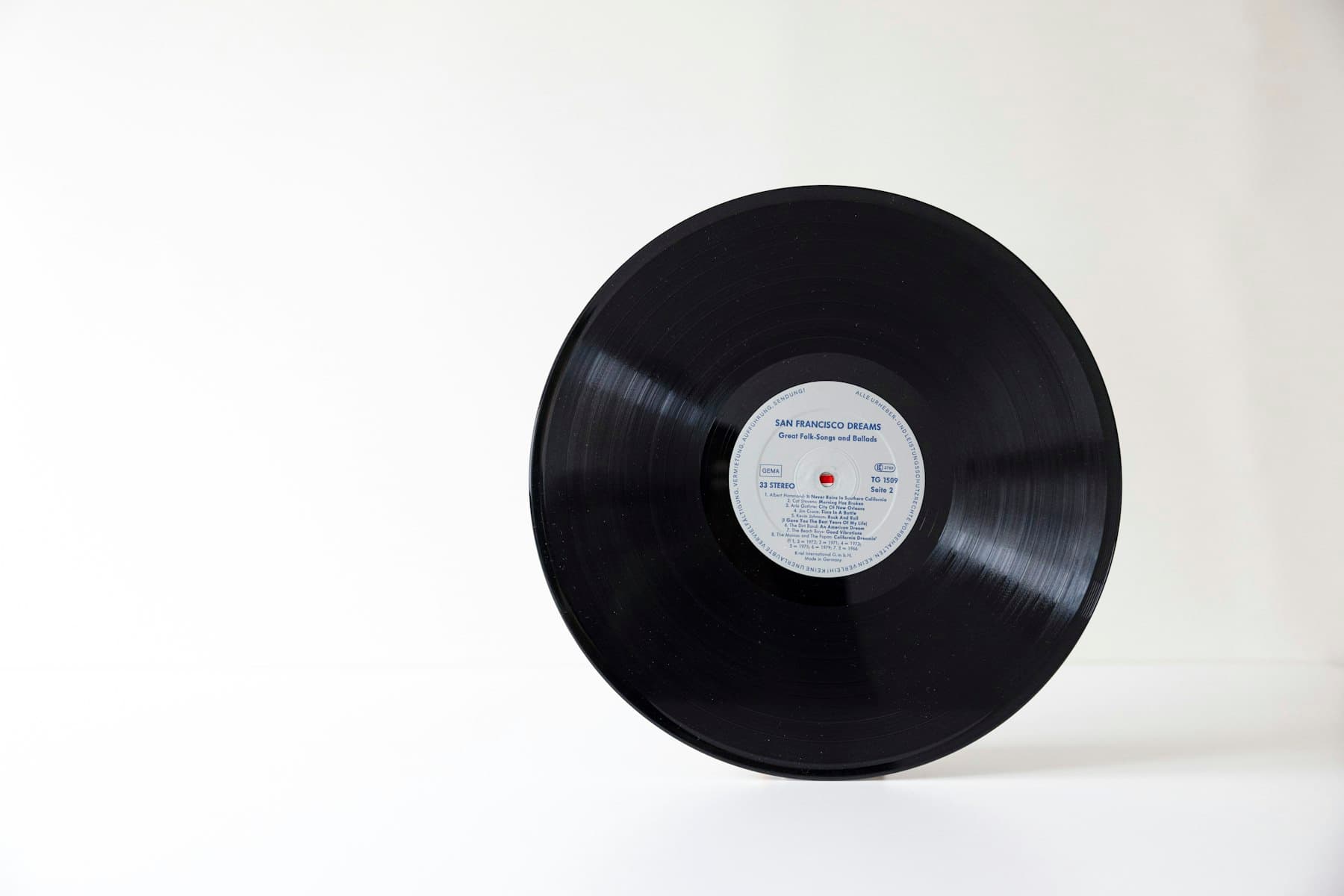 A vinyl record on the cleaning bench